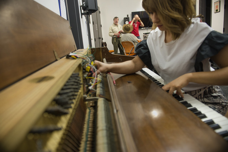 Student Wiring up Acoustic Piano