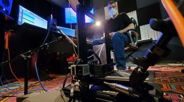 Mechanical Engineering graduate student recording custom 3D printer in the IMRC Center Recording and Production Lab